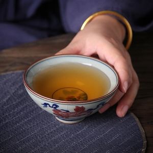Sip your tea in style with this Blue and White Bamboo-Hat Gracked Glaze Tea Tast